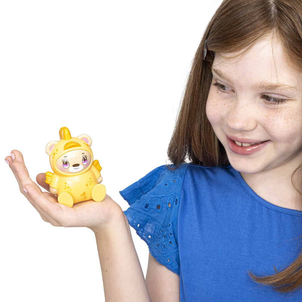Child holding a Moriah Elizabeth Costume Collection Series 3 Blind Bag toy.