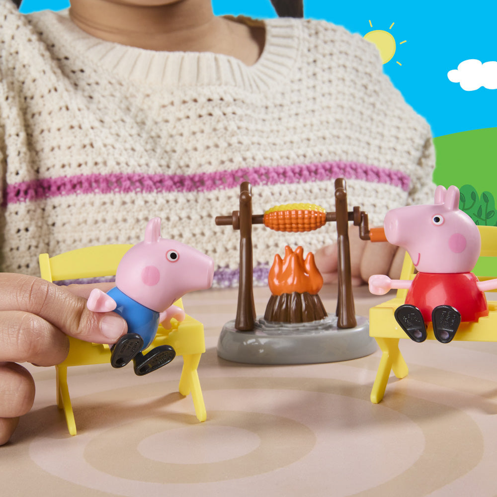 Girl playing with the Peppa Pig Three Little Piggies Caravan playset