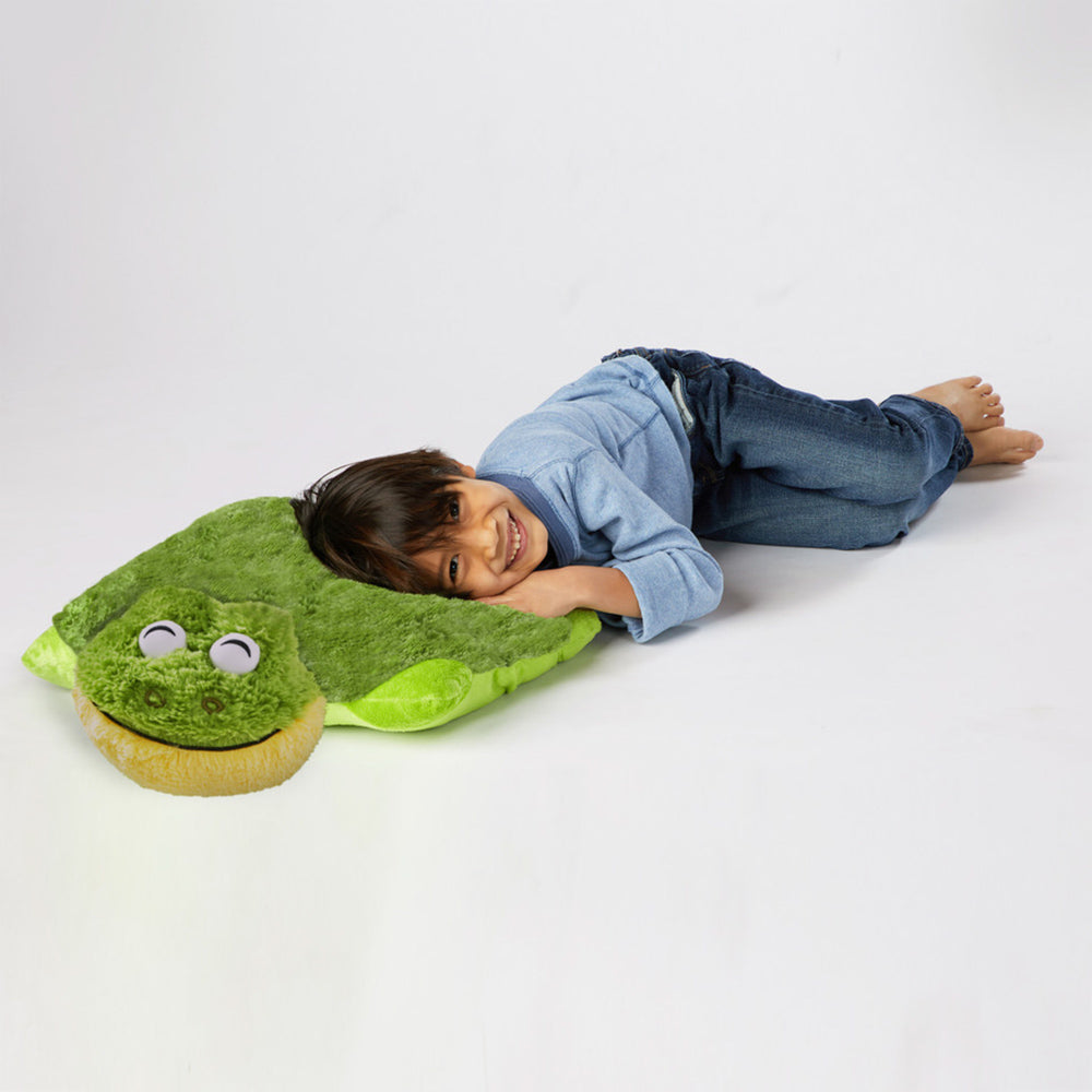 Child sleeping on Frog Pillow Pet