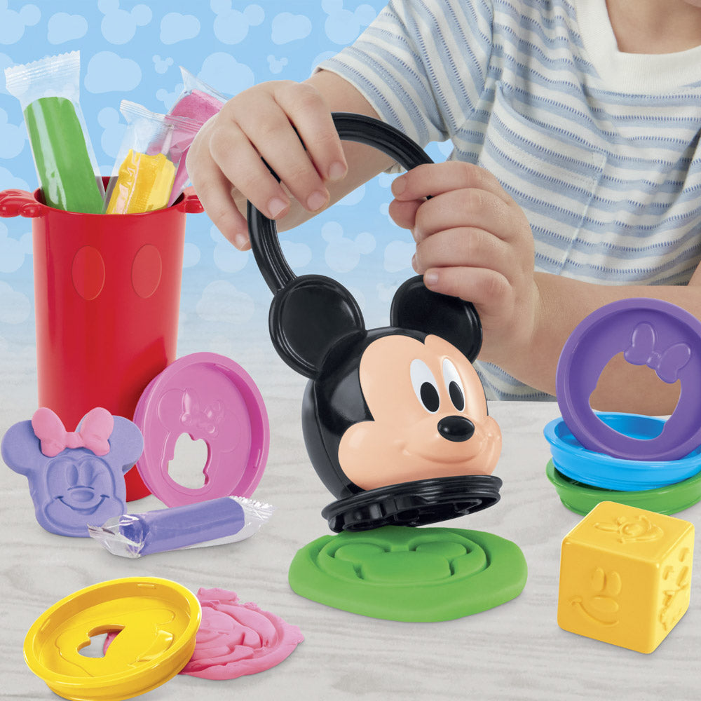 Child using the Play-Doh Disney Junior Happy Stackables Set