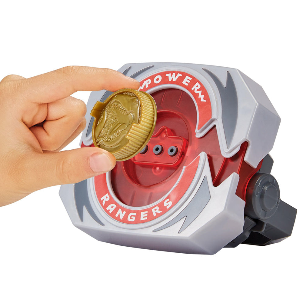 Place the coin into the Power Rangers Mighty Morphin Power Morpher Deluxe Buckle
