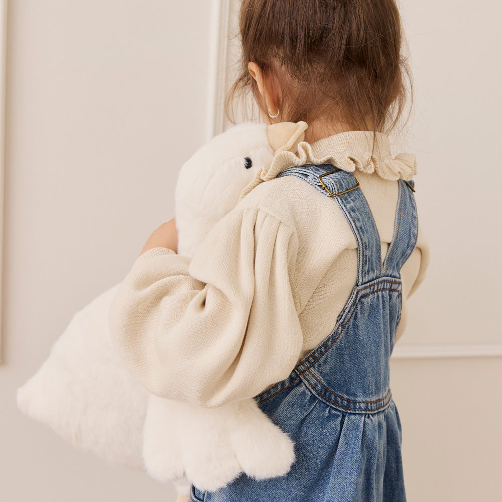 Child holding the Snuggle Bunnies Rose the Mummy Duck 45cm Plush soft toy