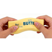 Hands holding the Squishy Butter Stick stress ball from Tiktok trends