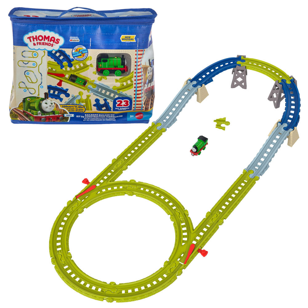 Thomas & Friends 2-3 rail toy set with a looped lime green track, blue and light blue curved rails, gray bridge supports, a small green and red diesel locomotive, and a matching blue carrying case on a white background.