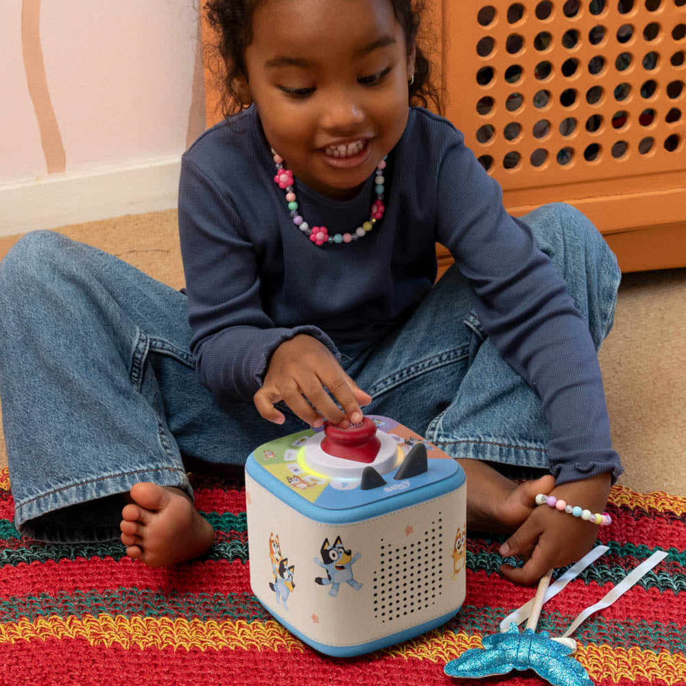 Child playing with the Toniebox 2 Interchangeable Sleeve: Bluey