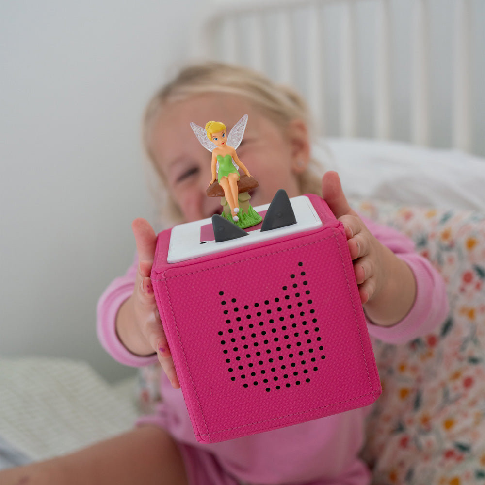 Child playing with the Tonies Audio Character Disney Tinkerbell figure,