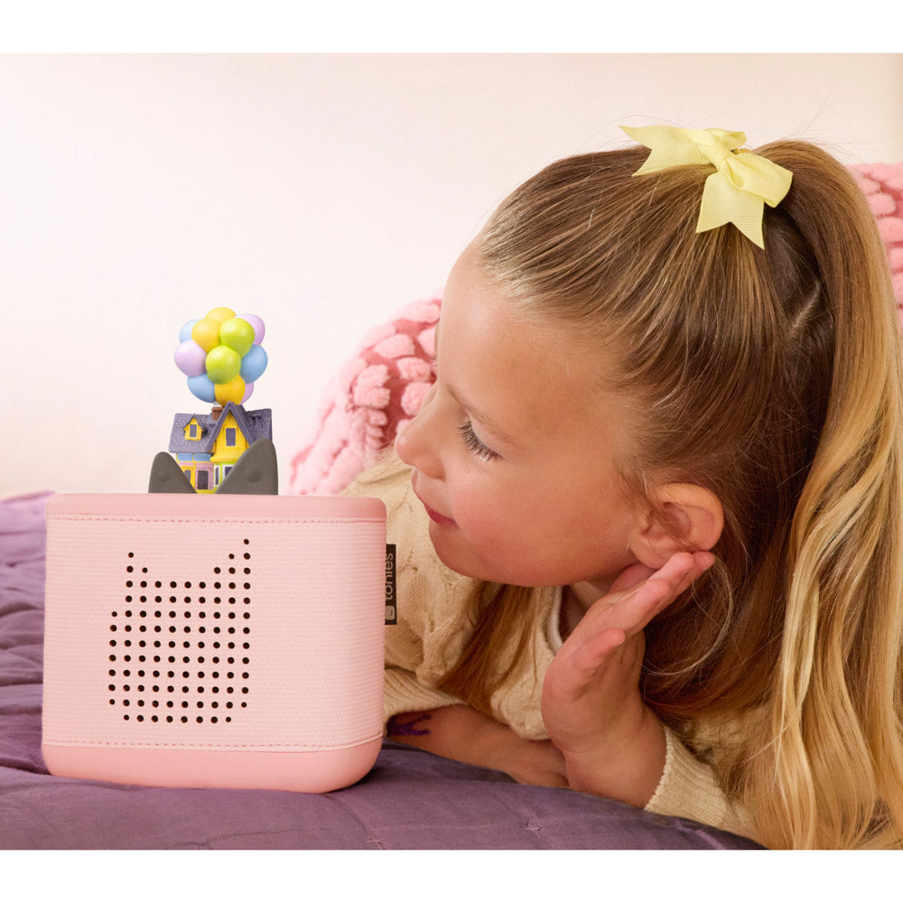 Child playing with the Tonies Audio Character - Disney Up figure