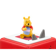Tonies Audio Character Disney Winnie The Pooh figure, on top of toniebox
