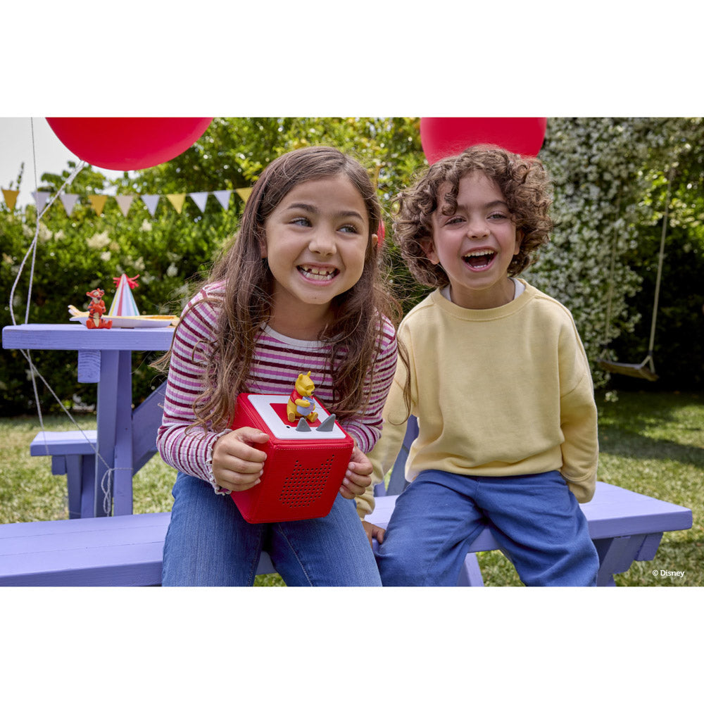 Children playing with the Tonies Audio Character Disney Winnie The Pooh figure