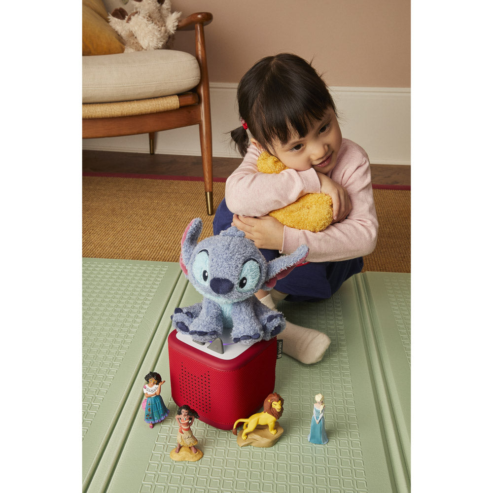 Girl playing with the Tonies Cuddle Tonie - Disney's Stitch plush figure