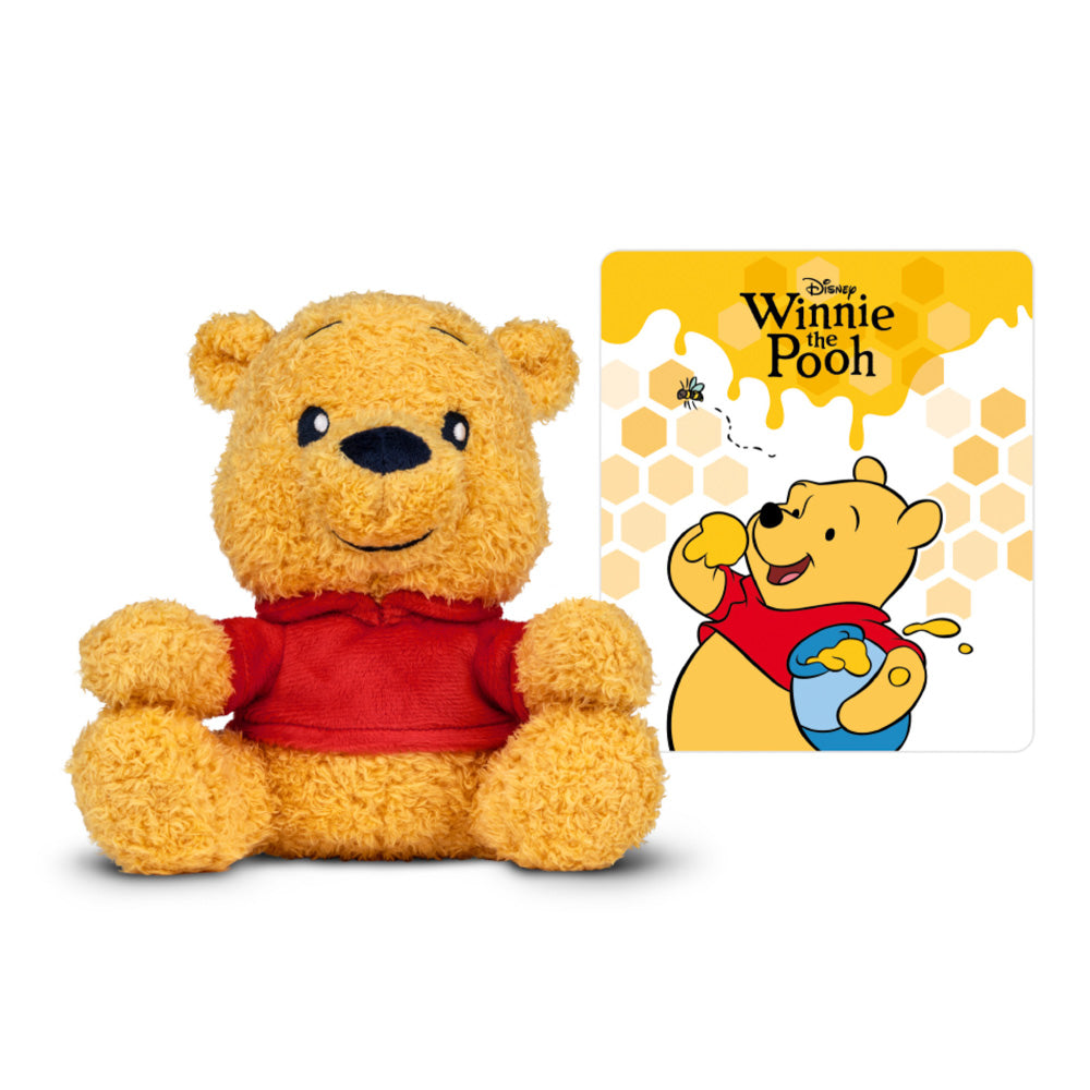Tonies Cuddle Tonie Winnie The Pooh plush figure, in front of movie poster
