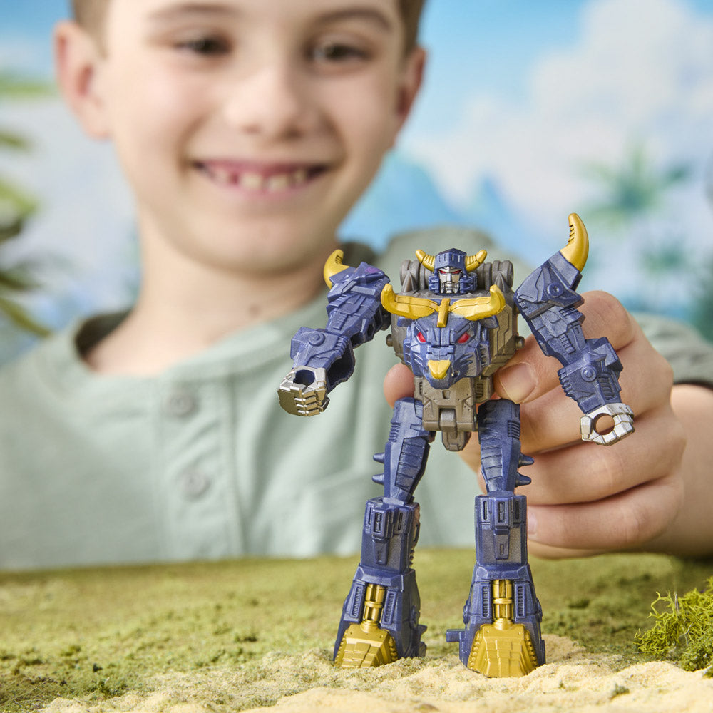 Child playing with the Transformers Cyberworld Cyber Changers Megatron figure toy
