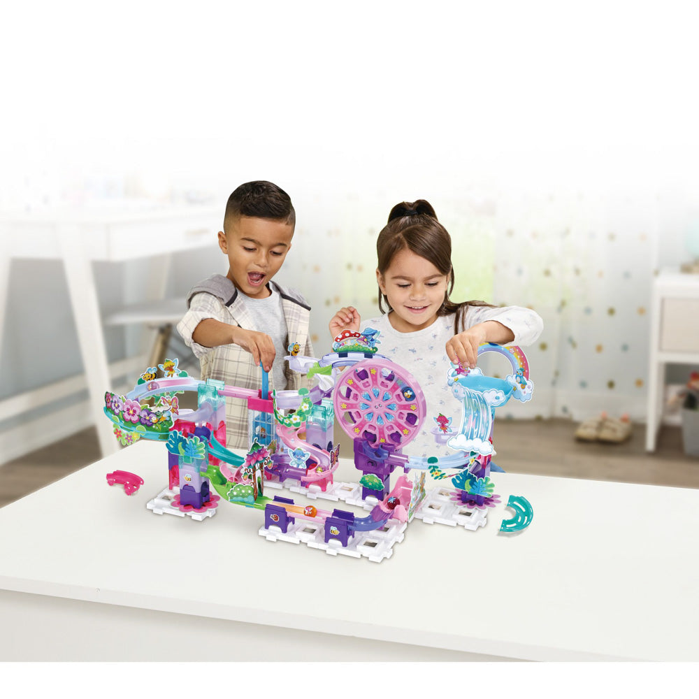 Children playing with the VTech Marble Rush Race Petal Power toy game