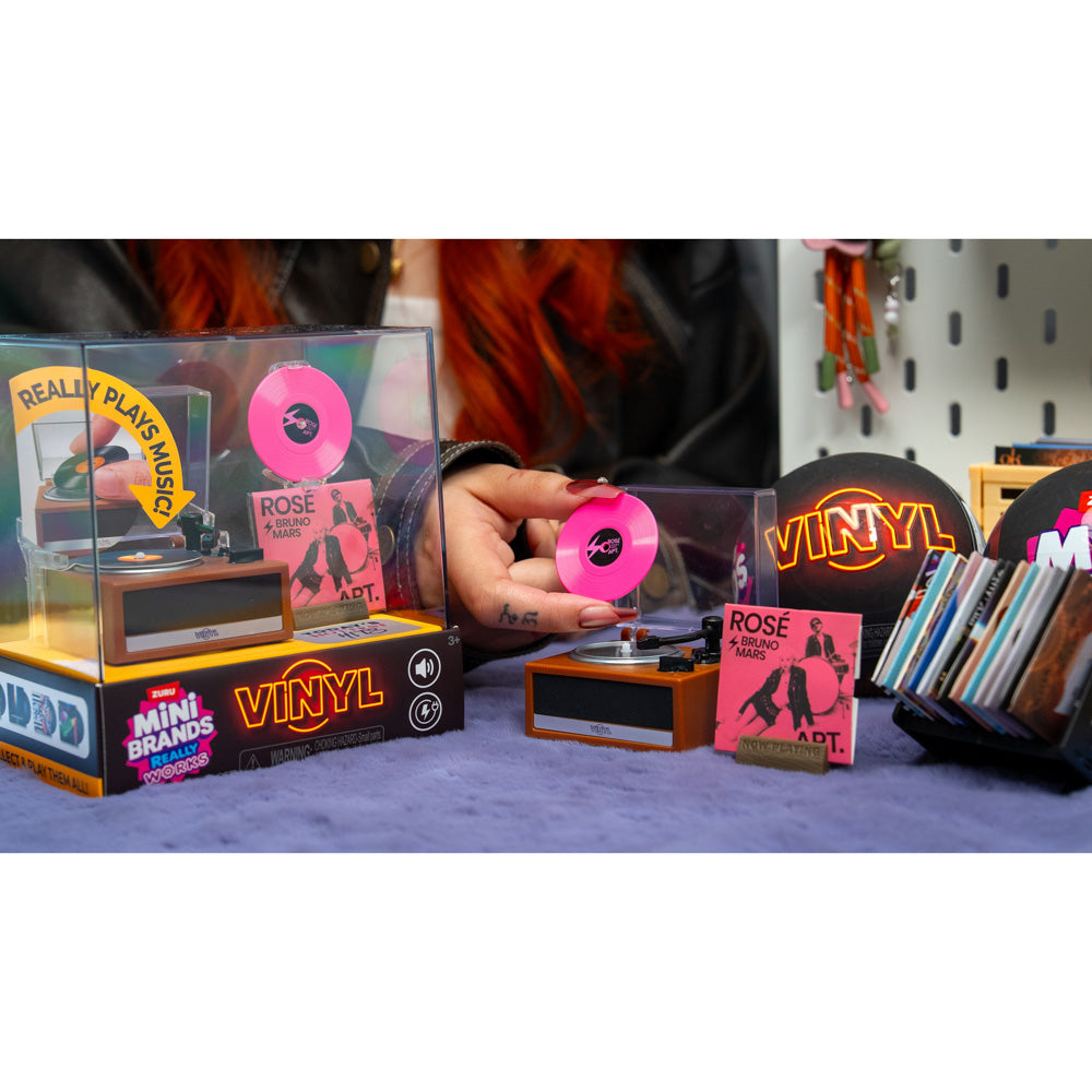 Hand holding the ZURU Mini Brands Vinyl Playset Series 1